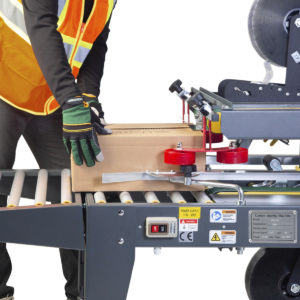 Máquina semiautomática para cerrar cajas de cartón con tracción superior/inferior y lateral - Modelo CCN-106